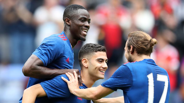 Manchester United's Andreas Pereira (c) celebrates his goal at Wigan