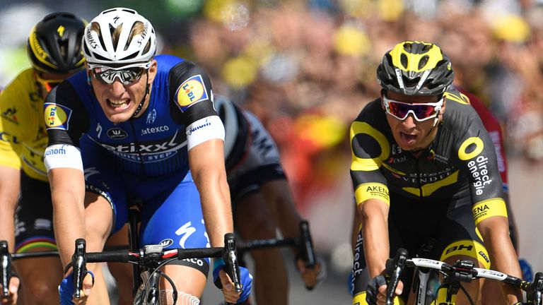 Germany's Marcel Kittel (2ndL) crosses the finish line ahead of France's Bryan Coquard (R) on stage four of the Tour de France