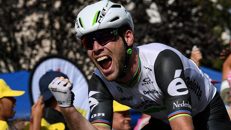 Great Britain's Mark Cavendish celebrates after crossing the finish line at the end of the 190,5 km sixth stage of the 103rd edition of the Tour de France 