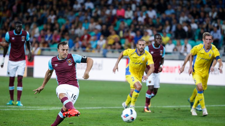 Mark Noble of West Ham scores a goal from a penalty kick during the UEFA Europa League Third qualifying round first leg v NK Domzale in Slovenia