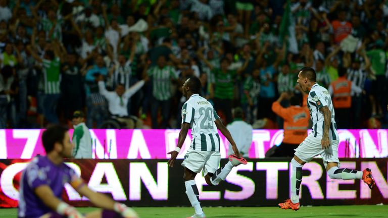 Colombia's Atletico Nacional player Marlos Moreno  (R) celebrates his goal  against Junior during their Colombian Football League final match at the Atanas