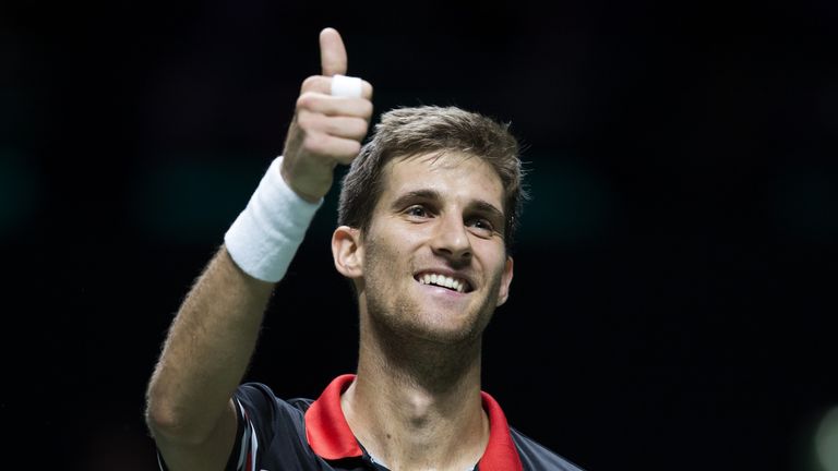 Martin Klizan of Slovakia celebrates after winning against Roberto Bautista Agut of Spain in the quarterfinals of the ABN AMRO World Tennis Tournament in R