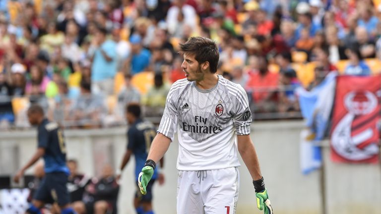 AC Milan goalkeeper Michael Agazzi reacts after conceding a fifth goal against Manchester City during a Champions Cup match at Heinz Field in Pittsburgh on