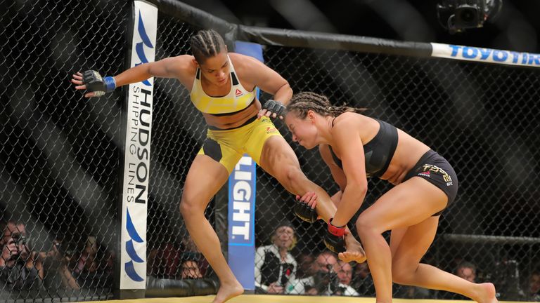 LAS VEGAS, NV - JULY 9: Miesha Tate looks to take down Amanda Nunes during the UFC 200 event at T-Mobile Arena on July 9, 2016 in Las Vegas, Nevada. (Photo