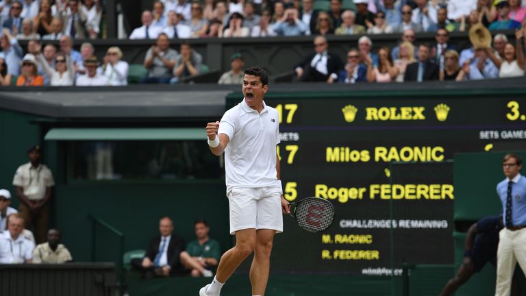Milos Raonic reacts during his match with Roger Federer