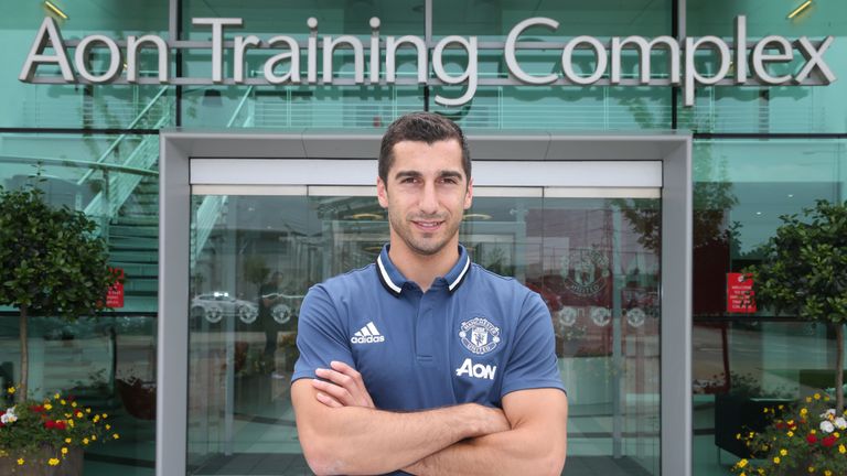 MANCHESTER, ENGLAND - JULY 06:  (EXCLUSIVE COVERAGE) Henrikh Mkhitaryan of Manchester United poses after signing for the club at Aon Training Complex on Ju