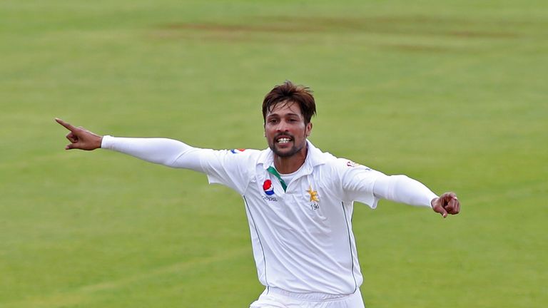 Mohammad Amir of Pakistan celebrates taking the wicket of Marcus Trescothick of Somerset
