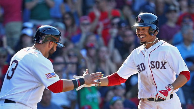 Mookie Betts (right) is having a great season for the Boston Red Sox