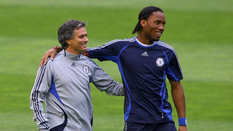 VALENCIA, SPAIN - APRIL 09: Chelsea Coach Jose Mourinho (L) shares a joke with striker Didier Drogba  during Chelsea training and press conference ahead of