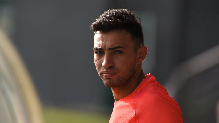 Barcelona's forward Munir El Haddadi arrives to attend the first pre-seasson training session at the Sports Center FC Barcelona Joan Gamper in Sant Joan De