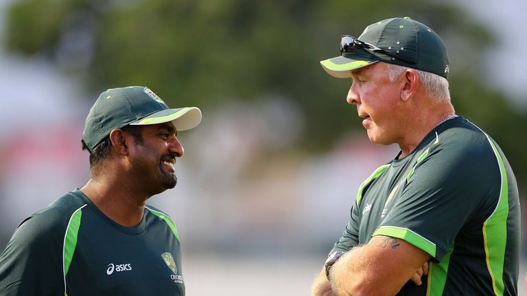 DUBAI, UNITED ARAB EMIRATES - OCTOBER 02: (L-R) Muttiah Muralitharan shares a light moment with Craig McDermott during the Australian training session at t