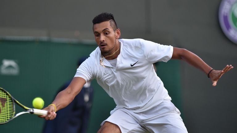 Australia's Nick Kyrgios returns to Spain's Feliciano Lopez in their men's singles third round match on the sixth day of the 2016 Wimbledon Championships a