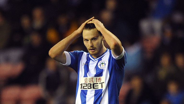Nick Powell has rejoined Wigan Athletic following his release by Manchester United