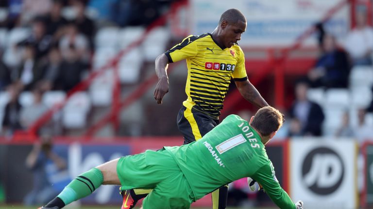 Stevenage goalkeeper Jamie Jones and Watford's Odion Ighalo battle for the ball during a pre-season friendly at the Lamex Stadium, Stevenage.