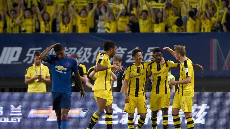 Borussia Dortmund's Ousmane Dembele (2R) celebrates with team-mates after scoring v Manchester United, International Champions Cup, Shanghai