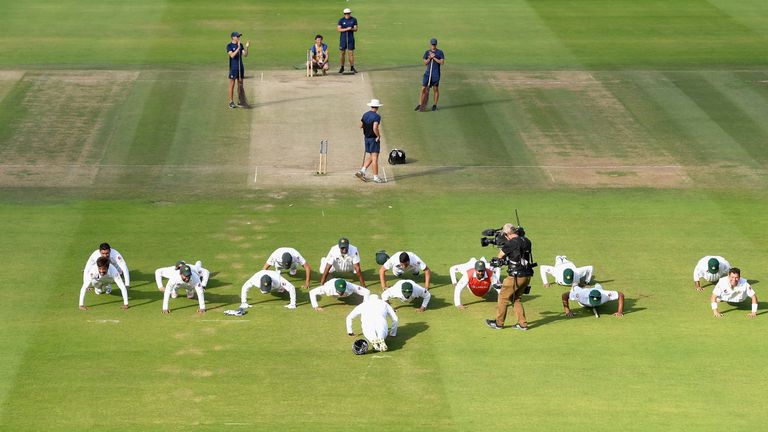  The Pakistan team perform push ups in celebration after winning the first Test
