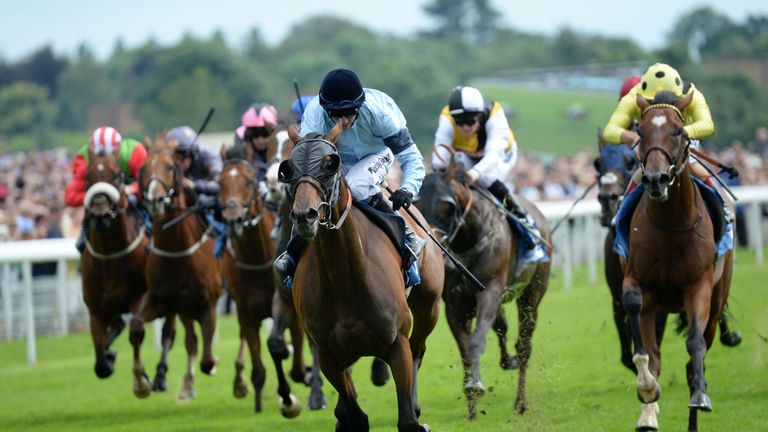 Pamona ridden by Jim Crowley (centre) wins the John Smith's Silver Cup Stakes during the John Smith's Cup Meeting at York Racecourse. PRESS ASSOCIATION Pho