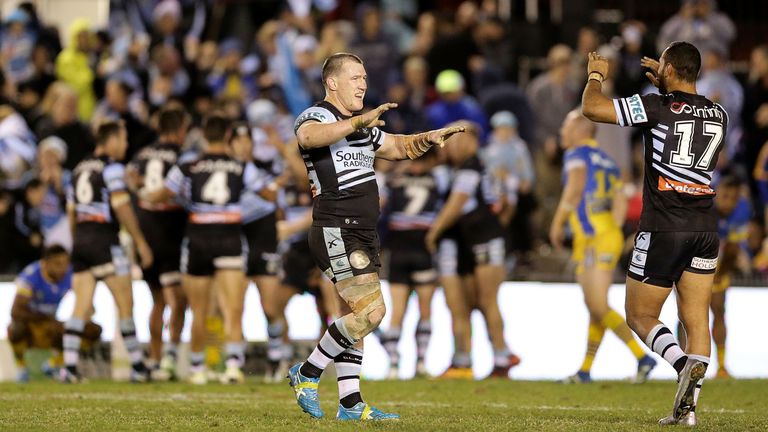  Paul Gallen and Jayson Bukuya of the Cronulla  Sharks celebrate victory