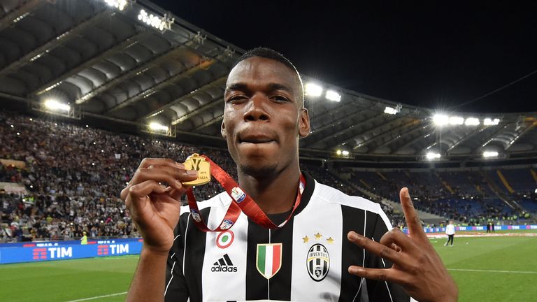 Paul Pogba of Juventus celebrates the victory after the TIM Cup match between AC Milan and Juventus FC at Stadio Olimpico