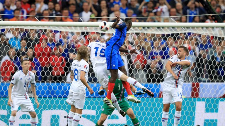 France's Paul Pogba (second right) scores their second goal of the game with a header 