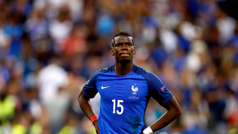 Paul Pogba of France shows his dejection