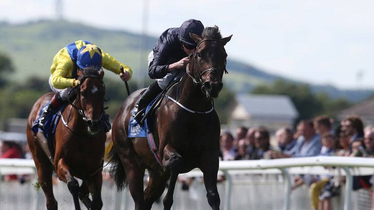 Peace Envoy and Ryan Moore take the Jebel Ali Racecourse & Stables Anglesey Stakes.