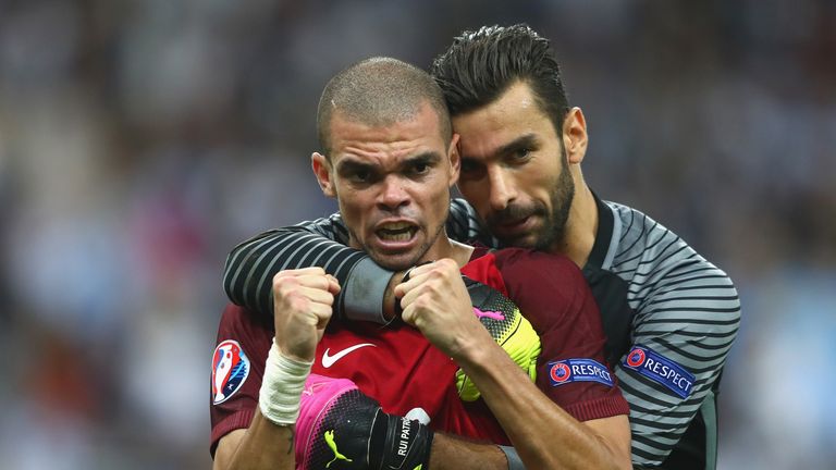 Pepe celebrates with Rui Patricio at the final whistle after Portugal's 1-0 win over France