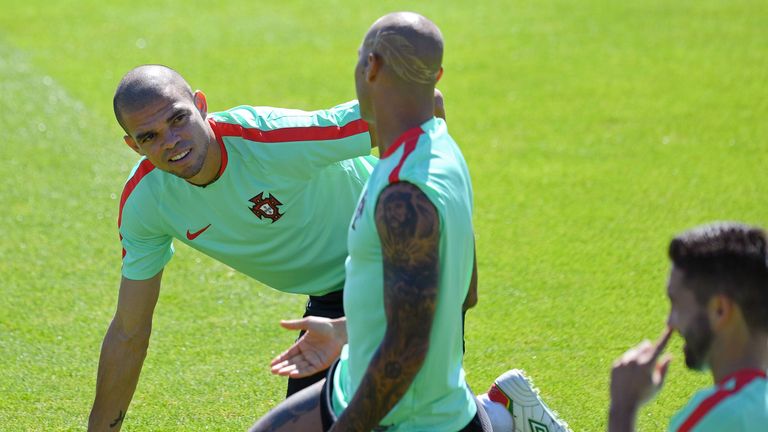 Portugal's defender Pepe (L)