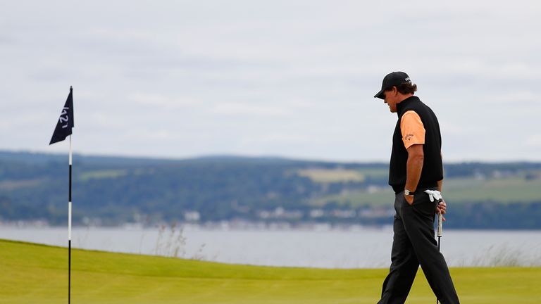 INVERNESS, SCOTLAND - JULY 06:  Phil Mickelson of the United States walks on the 11th green during a pro-am round ahead of the AAM Scottish Open at Castle 