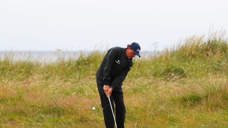 TROON, SCOTLAND - JULY 15:  Phil Mickelson of the United States chips on to the 2nd green during the second round on day two of the 145th Open Championship