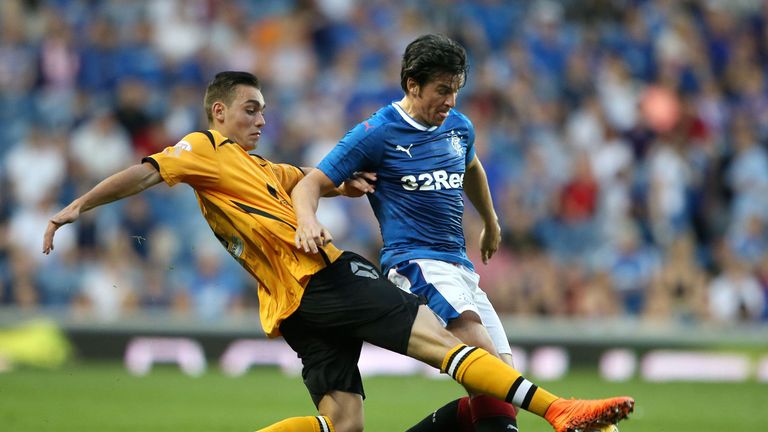 Rangers Joey Barton (right) challenges Annan Athletic's Przemyslaw Dachnowicz during the Betfred Cup, Group F match at the Ibrox Stadium, Glasgow. PRESS AS