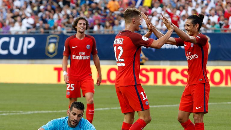 Paris Saint-Germain defender Thomas Meunier (C) celebrates his second goal
