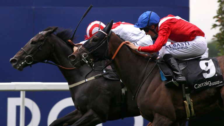 Red Box, ridden by Luke Morris , battles with Namhroodah under Jamie Spencer in the Carraig Insurance EBF StallionsBreeding Winners Valiant Stakes at Ascot