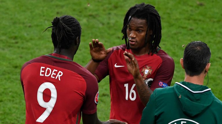 Portugal's midfielder Renato Sanches (C) leaves the pitch for Portugal's forward Eder during the Euro 2016 final football match between Portugal and France