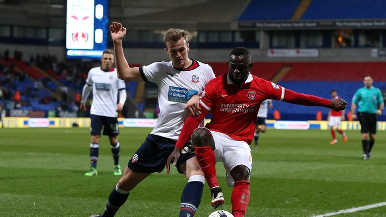 Bolton's Holding challenges Charlton Athletic striker Igor Vetokele 