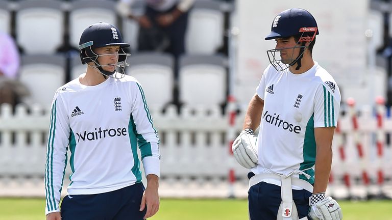 England's captain Alastair Cook (R) and England's Joe Root chat during a practice session at Lord's cricket ground in London on July 13, 2016. England play