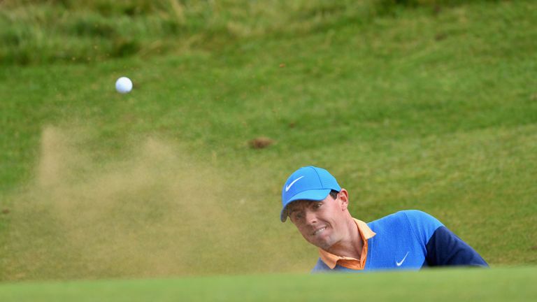 TROON, SCOTLAND - JULY 12:  Rory McIlroy of Northern Ireland plays a shot from a bunker during a practice round ahead of the 145th Open Championship at Roy