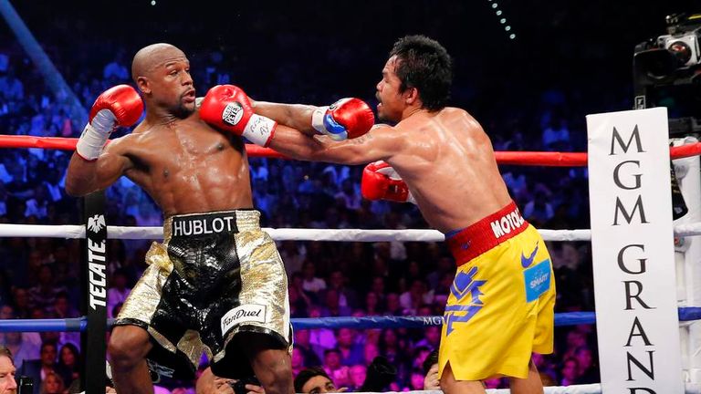 Mayweather and Pacquiao in the ring at the MGM Grand.