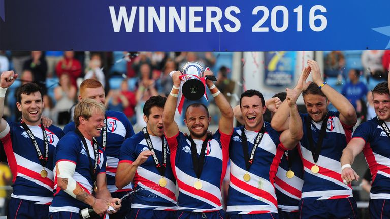 Great Britain Royals captain James Trehane lift the Cup trophy at the Exeter Sevens