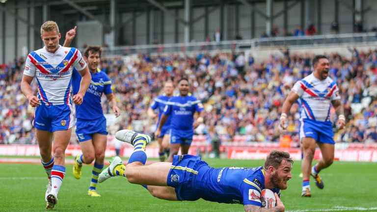 Daryl Clark scrambles over from dummy half to score