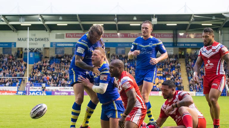 Warrington's Joe Westerman is congratulated after scoring a try against Salford