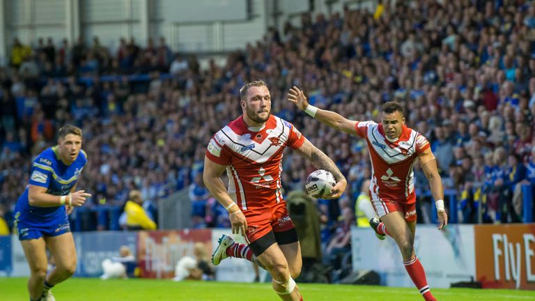 Salford's Josh Griffin outruns the Warrington defence to score a try