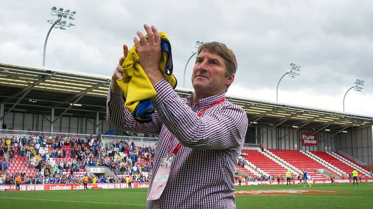 Warrington head coach Tony Smith salutes the supporters after their Challenge Cup semi-final win over Wakefield