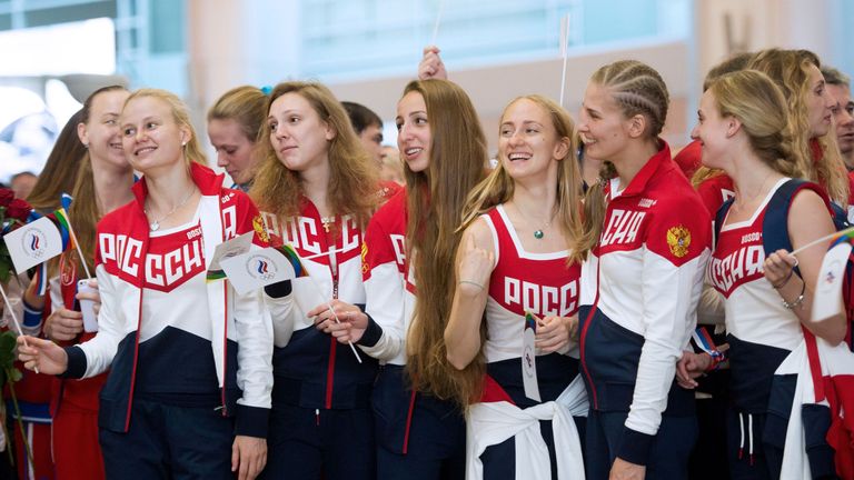 Russian Olympic team members attend a farewell ceremony at Moscow's Sheremetyevo airport    