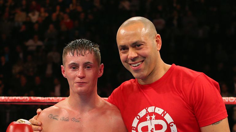 Ryan Burnett and trainer Adam Booth following the fight against Jason Booth