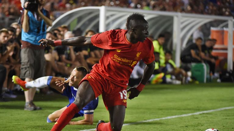 Defender John Terry of Chelsea (L) clashes with Forward Sadio Mane of Liverpool (R) during their International Champions Cup (ICC) game at the Rose Bowl St