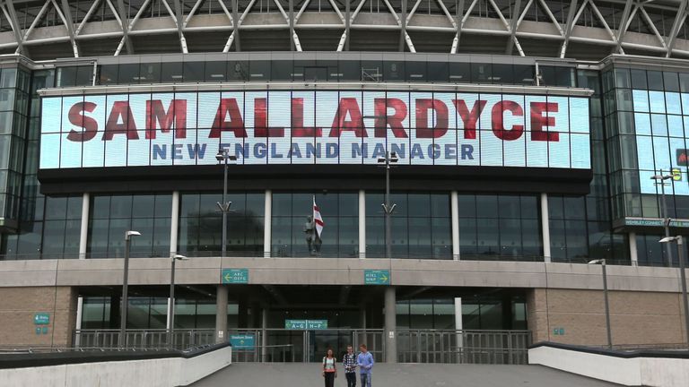 A large digital display reads 'Sam Allardyce New England Manager' at Wembley Stadium, London