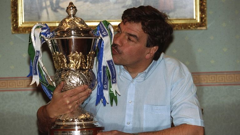 1 May 1998:  Notts County Manager Sam Allardyce kisses the Division Three Trophy after their success during the 1997-98 season.