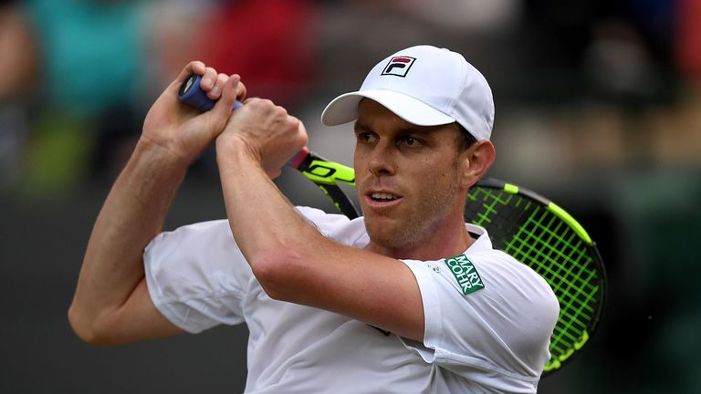 LONDON, ENGLAND - JULY 01: Sam Querrey of The United States plays a backhand during the Men's Singles third round match against Novak Djokovic of Serbia on