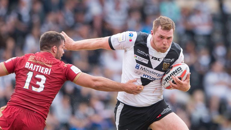 Hull FC's Scott Taylor fends off Catalans' Jason Batieri.